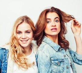 best friends teenage girls together having fun, posing emotional on white background, besties happy smiling, lifestyle people concept