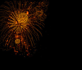 Wall Mural - Abstract Fireworks Background. Vintage gold  Fireworks and bokeh in New Year Eve with copy space. Celebration concept