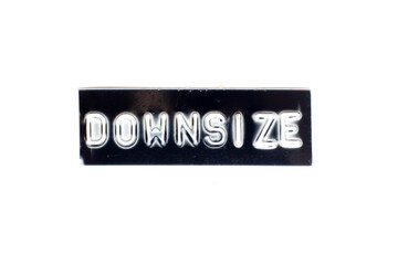 Embossed letter in word downsize in black banner on white background