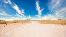Gravel Road And Beautiful Landscape In Namibia