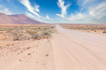 gravel road and beautiful landscape in namibia
