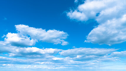 Blue sky with white clouds after a thunderstorm landscape.