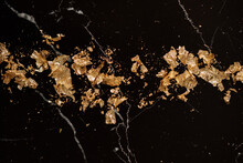 Gold Leaf Petals On Black Marble