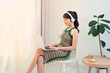 © Maki Company Limited/Stocksy - Young attractive asian woman using laptop at home