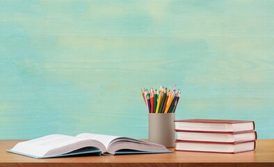 Poster - Study books and colored pencils on the teacher's desk