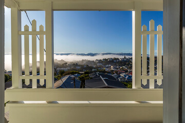 Poster - A view from the wooden terrace of a foggy day in Wellington, New Zealand