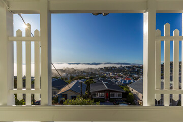 Poster - A view from the wooden terrace of a foggy day in Wellington, New Zealand