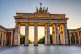 Fototapeta Paryż - The historic Brandenburg Gate in Berlin at sunset with no people