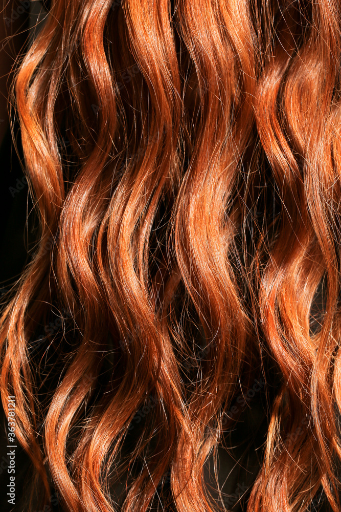 Curly red hair as background