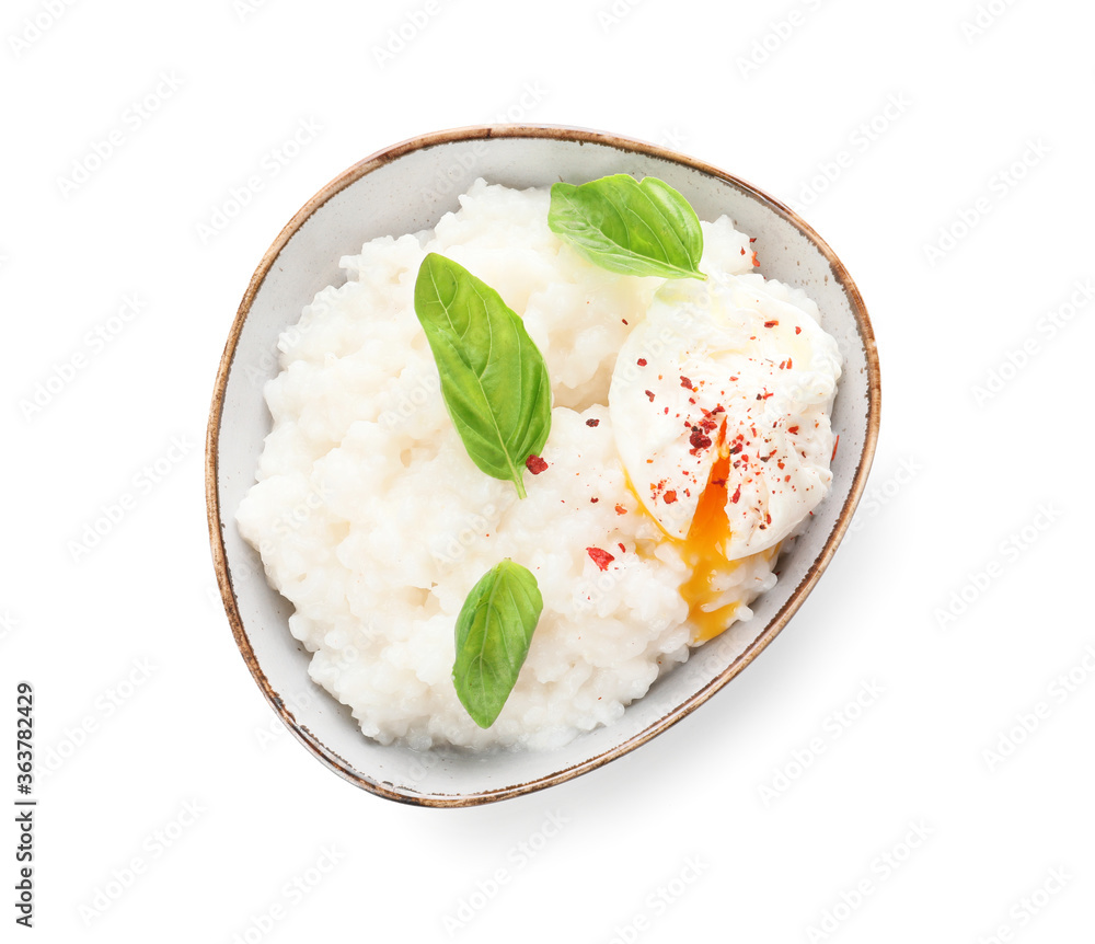 Bowl with boiled rice and egg on white background