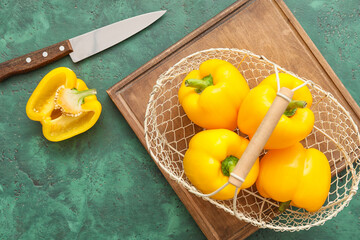 Composition with yellow bell pepper on table