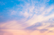 Soft Blue Sunset Sky With Light Pink Clouds