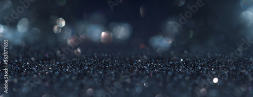 Fotomural Abstract dark blue background with blurred silver bokeh