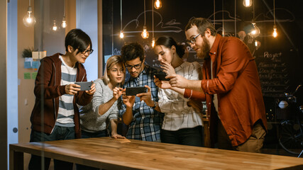 Wall Mural - great concept for augmented reality mock-up. three young developers look at augmented reality throug