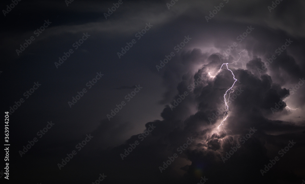 Low Angle View Of Lightning Against Cloudy Sky At Dusk - obrazy, fototapety, plakaty 