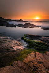 Sunset in the basque coast under Jaizkibel mountain in Hondarribia, Basque Country.	