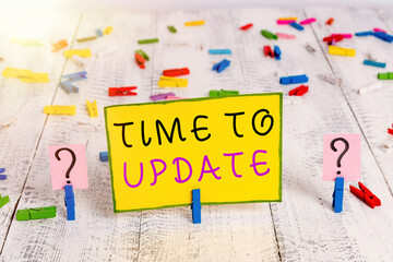 Wall Mural - text sign showing time to update. business photo text system software update for enhancement or comp