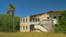 Old Abandoned Hotel Crumbles Down In The Rugged Tropical Elements On Barbados.