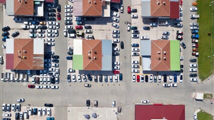 Wall Mural - Aerial view of brand new and second hand car dealers site