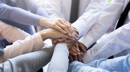 Cuadros en Lienzo Stack of hands. Unity and teamwork concept.
