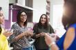 © Sam Edwards/Caia Image - Women talking and drinking tea in kitchen