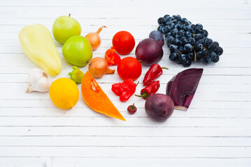 Wall Mural - fruits and vegetables on white wood table