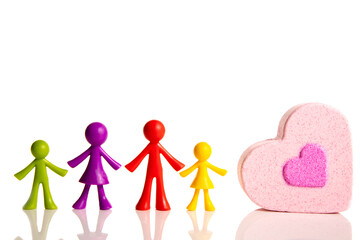 Happy family concept. Family figures and pink heart on isolate