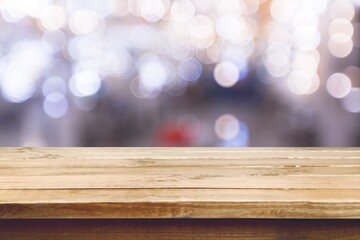 Wall Mural - Empty wooden table on bokeh background