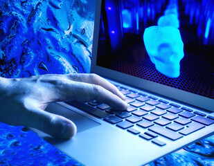 human hand on keyboard of mobile computer programming complex shape production
