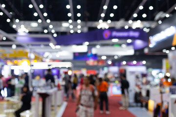 abstract blur people in exhibition hall event trade show expo background. business convention show, 