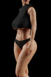 © PixlMakr - Busty sexy female in black sporty clothes