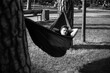 © Hennadii - Young guy has a rest in summer in a hammock
