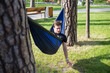 © Hennadii - Young guy has a rest in summer in a hammock