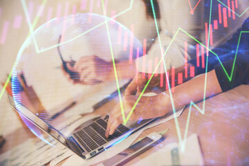 Multi exposure of woman hands typing on computer and financial chart hologram drawing. Stock market analysis concept.