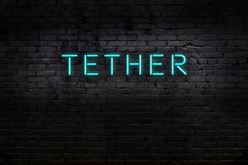 Wall Mural - Neon sign. Word tether against brick wall. Night view