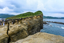 New Taipei, Taiwan - SEP 14, 2019: Many People Come To Visit Trunk Rock In Shenao Cape.