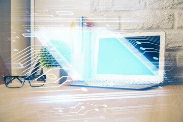 double exposure of desktop computer and technology theme hologram. concept of software development.