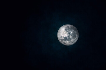 Wall Mural - abstract image of full moon in cloudy day. (elements of this image furnished by nasa.)