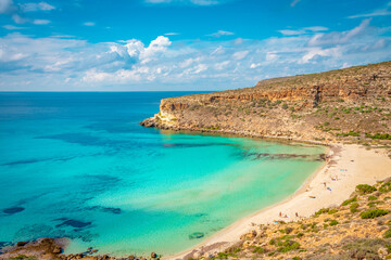 Wall Mural - Crystal clear water at the pristine Rabbit’s beach (spiaggia dei conigli) in Lampedusa, Pelagie islands, Sicily