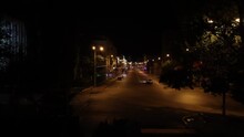 View Of The Night Street Of The Night City With Driving Cars, Luminous Road Lights