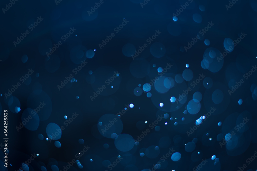 abstract sparkle bokeh light effect with navy blue background Stock ...