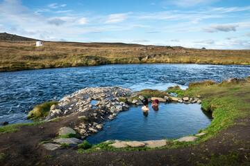 fosslaug hot pot near a river, iceland