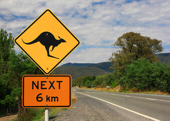 Australian road sign warning to watch for kangaroos, on the side of a country road.
K

By K.A.Willis