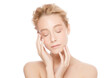 © Damir Khabirov - Beauty portrait of young beautiful blonde woman posing with closed eyes, touching her clean face skin, isolated on white background