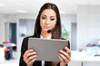 © Minerva Studio - Woman remote meeting using a tablet and headset