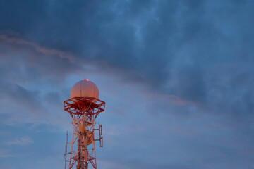 view of weather radar or weather station with dramatic storm sky and clouds for satellite communicat