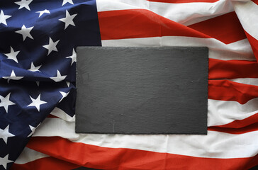 American flag on a black background. Space for text.