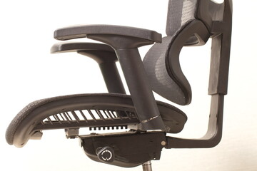 Wall Mural - office ergonomic chair with mesh coating.