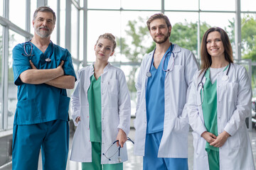 Group of medical staff smiling at the hospital.