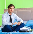 © Elnur - Businessman working in the hotel room